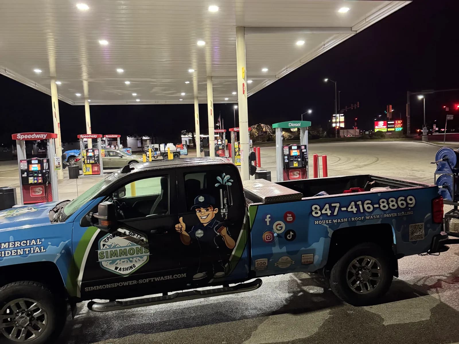 Our truck under the Speedway canopy at night