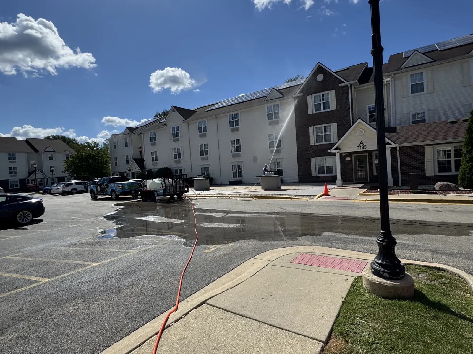 Cleaning a hotel parking lot
