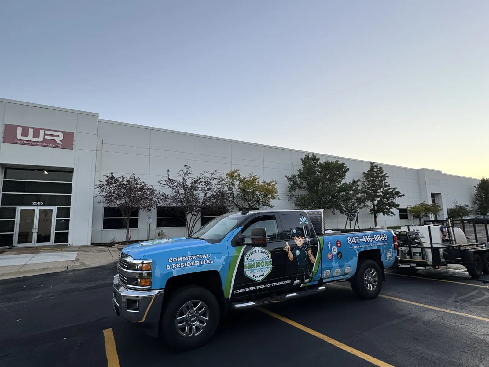 Our truck at an industrial building at dusk